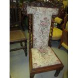 Victorian carved rosewood low seat nursing chair,