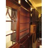 19th Century mahogany library bookcase with a moulded cornice above open adjustable shelves,