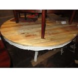 Large 20th Century circular rustic pine topped kitchen table on carved shaped base with central