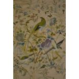 Oriental silkwork panel heavily decorated with birds and flowers on an ivory silk backing with