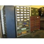 Four table cabinets of miniature drawers containing a large quantity of keys, screws,