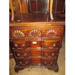 Reproduction American style dwarf chest of four drawers on moulded bracket feet