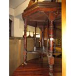 Edwardian octagonal marquetry inlaid two tier occasional table on turned supports