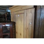 Small Victorian pine wardrobe with single door above drawer