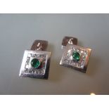 Pair of 18ct white gold cufflinks set emerald and diamonds