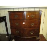 Reproduction walnut and crossbanded serpentine fronted chest of two short and two long drawers with