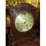 Late 19th or early 20th Century mahogany bracket clock with carved applied decoration the circular