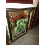 Reproduction Shamrock Whisky advertising wall mirror together with a similar painted wooden