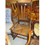 19th Century slat back rocking chair on turned supports
