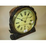 19th Century oak cased wall clock with floral carved bezel,