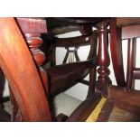Pair of reproduction mahogany open armchairs with lyre backs and sabre legs