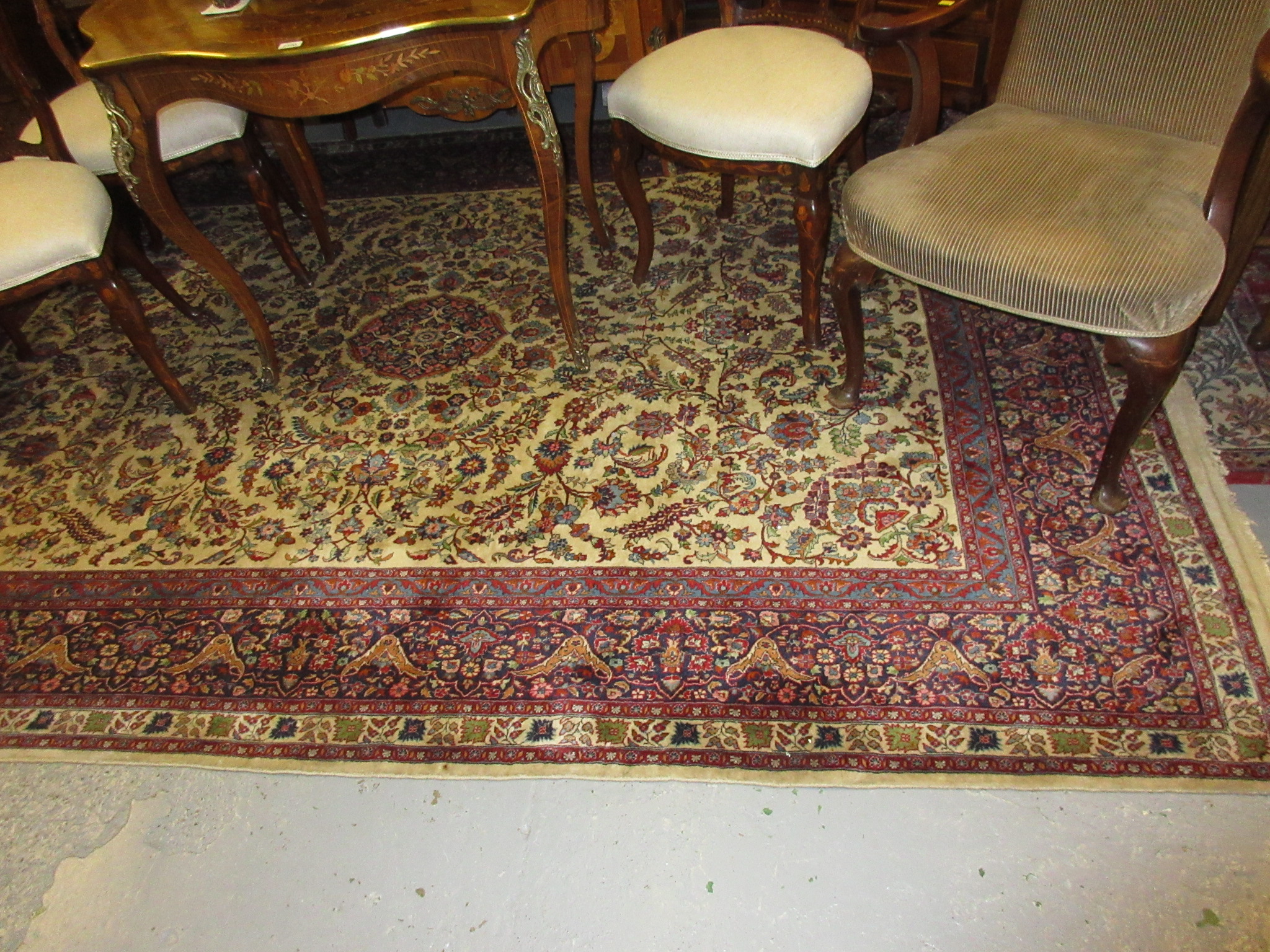 Tabriz carpet with medallion and all-over floral design on ivory ground with borders,