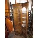 Pair of small good quality reproduction oak standing corner cabinets with open shelves above carved