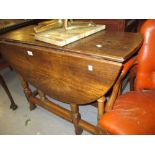 Small 18th Century oak oval gate leg table on baluster turned supports with stretchers and breganza