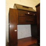 1930's Oak bureau with integral side bookshelves together with an oval mahogany wall mirror