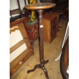 Early 20th Century mahogany turned column tripod torchere in George III style