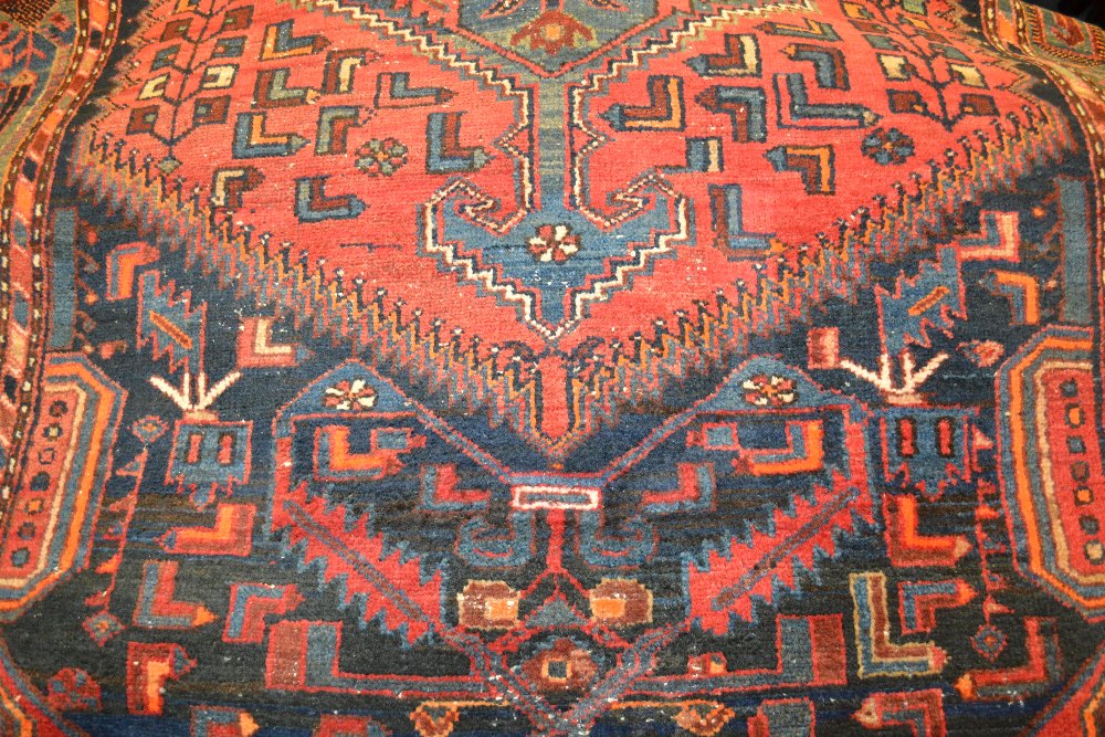 Hamadan rug with stylised medallion and all-over design