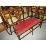 Edwardian mahogany line inlaid two seat open arm sofa on square tapering supports