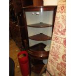 Reproduction mahogany bow front standing corner cabinet with glazed door