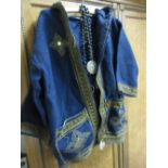 Middle Eastern embroidered jacket together with Middle Eastern bead necklace