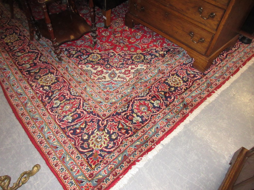 Mid 20th Century Kashan carpet with lobed medallion and all-over floral design on a red ground with