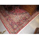 Mid 20th Century Kashan carpet with lobed medallion and all-over floral design on a red ground with
