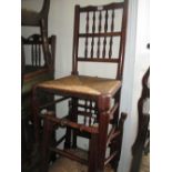 Harlequin set of six 18th Century oak rush seated spindle back chairs on turned supports