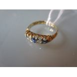 Edwardian 18ct gold five stone sapphire and diamond ring