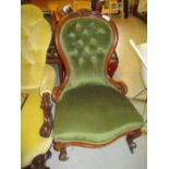 Victorian carved walnut and button upholstered low seat nursing chair