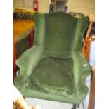 Early 20th Century green dralon upholstered wing back armchair on mahogany cabriole and pad