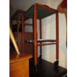 Mid 20th Century black and orange taped two tier tea trolley with chromed and glass fitted trays