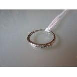 Platinum diamond set half hoop ring