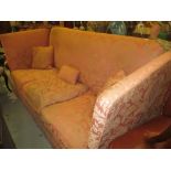 Knole type three seat sofa upholstered in pink figured damask