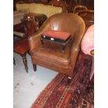 20th Century brown leather tub shaped chair on square tapering front supports