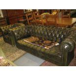 Green deep buttoned leather upholstered Chesterfield sofa together with a matching armchair