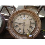 Large late 19th Century oak cased circular wall clock, the painted dial with Roman numerals,