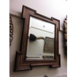 19th Century rosewood boxwood and ivory line inlaid wall mirror with a shaped frame and bevelled