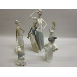 Two boxed Lladro porcelain figures together with three boxed Nao figures