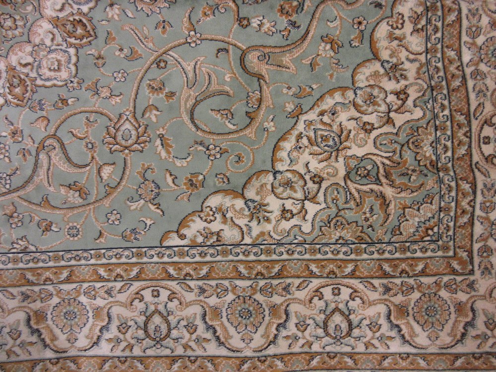 Green ground machine woven Kashan style carpet, 2.3m x 1.