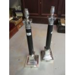 Pair of silver plated and marble Corinthian column table lamps on stepped square bases