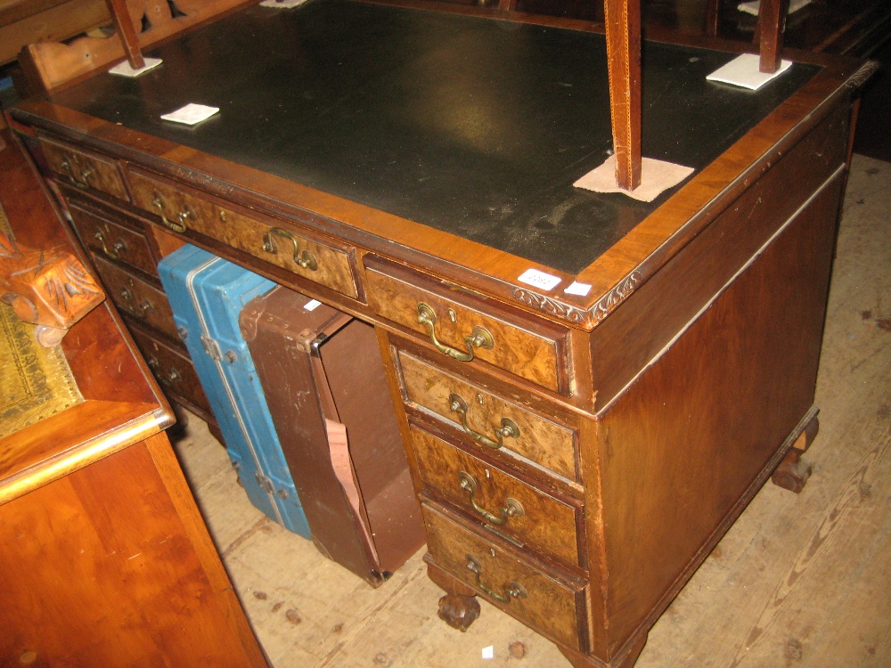 Mid 20th Century figured walnut twin pedestal desk,