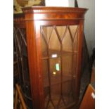 Reproduction mahogany standing corner cabinet