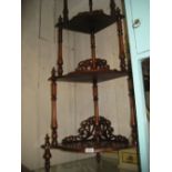 Reproduction mahogany four tier corner whatnot in Victorian style