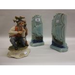 Pair of Sarreguemines pottery vases in the form of ships and a Capo di Monte figure of a man (a/f)