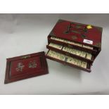 Early 20th Century Hamley metal mounted wooden mahjong set