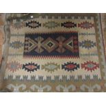 Small Kelim rug with all-over geometric design on an ivory ground
