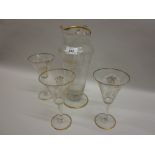 19th Century decanter and three matching glasses