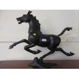Chinese brown patinated bronze figure of a galloping horse,