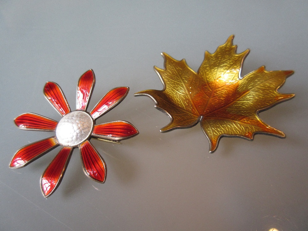 Two Norwegian silver enamel decorated brooches