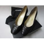 Pair of Chanel ladies shoes in brown and black, size 39.